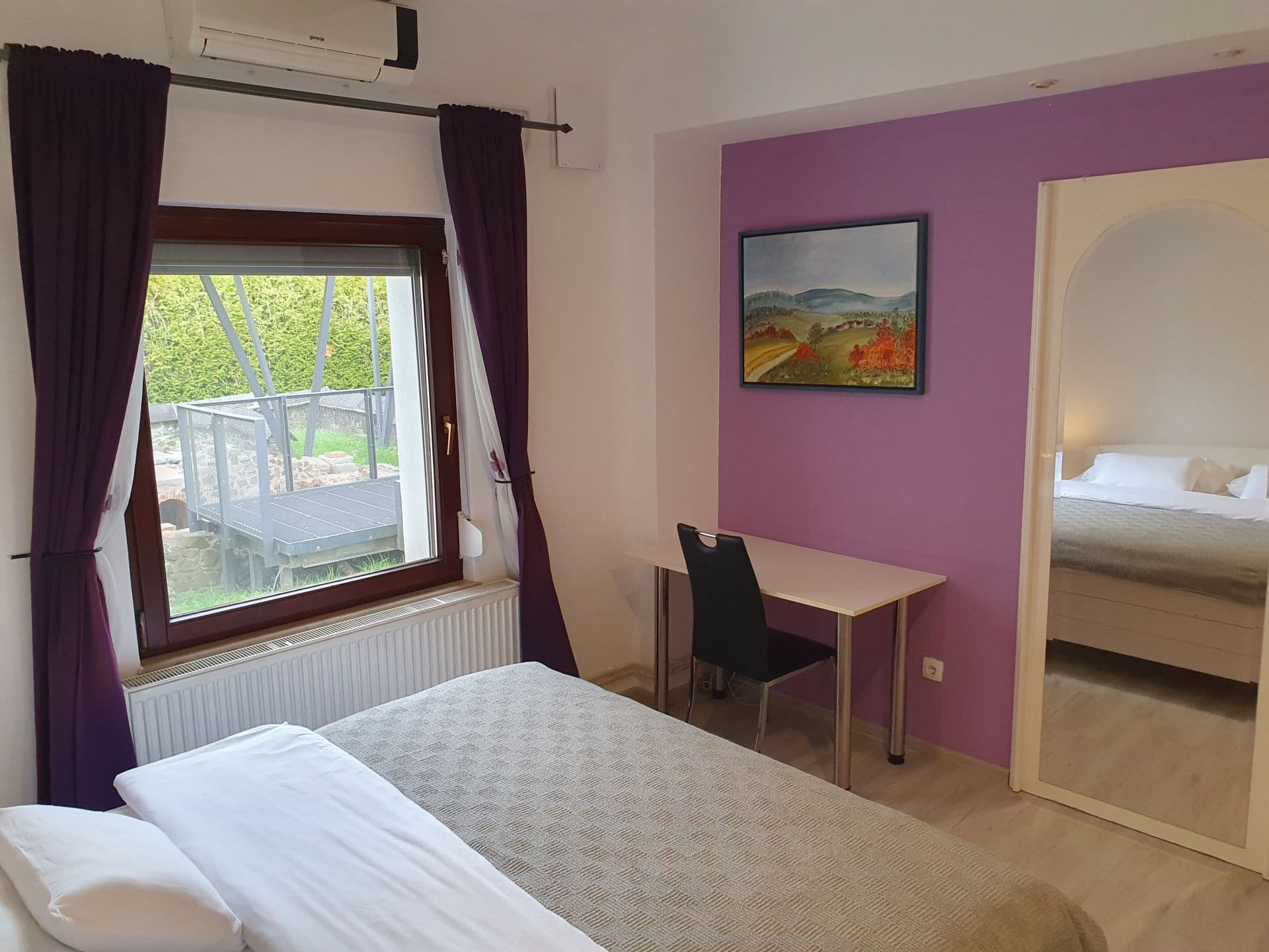 Cozy living room featuring comfortable sofa and warm interior design