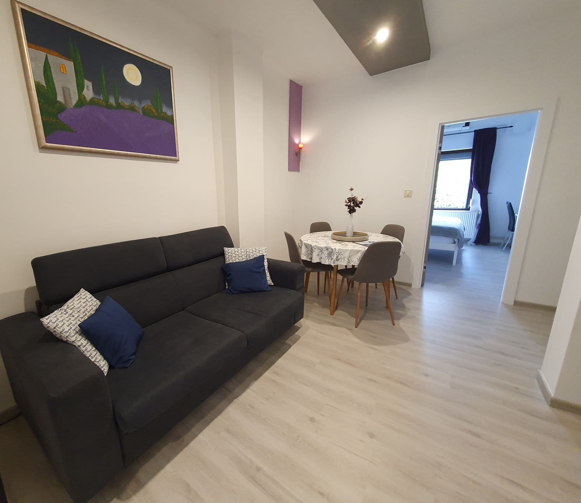 Dining area with table and chairs, perfect for family meals