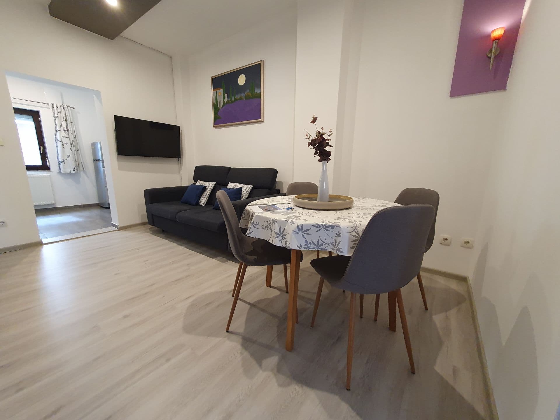Kitchen showcasing modern appliances including refrigerator, oven, and stove