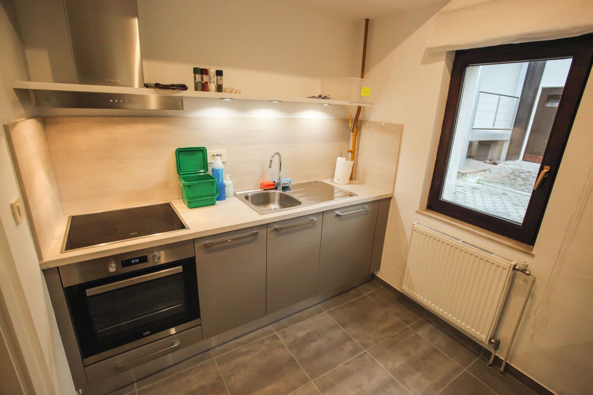 Alternative view of the bedroom showing layout and natural lighting
