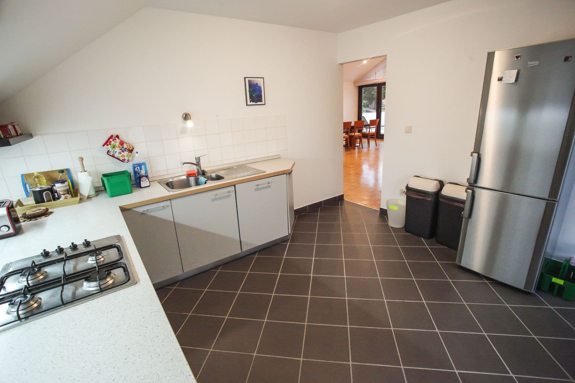 Bright and spacious living room with comfortable seating and natural light