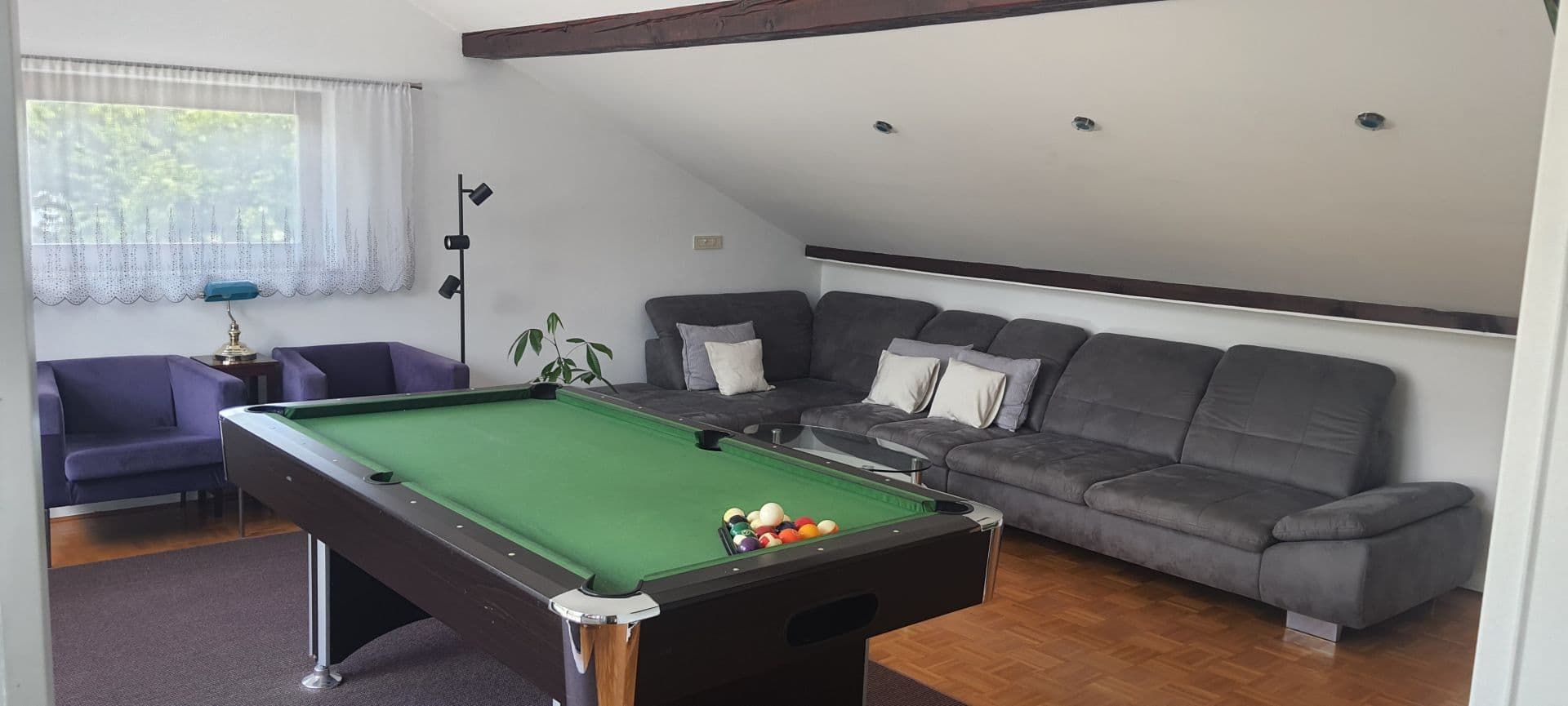 Room interior highlighting the spacious layout and contemporary decor