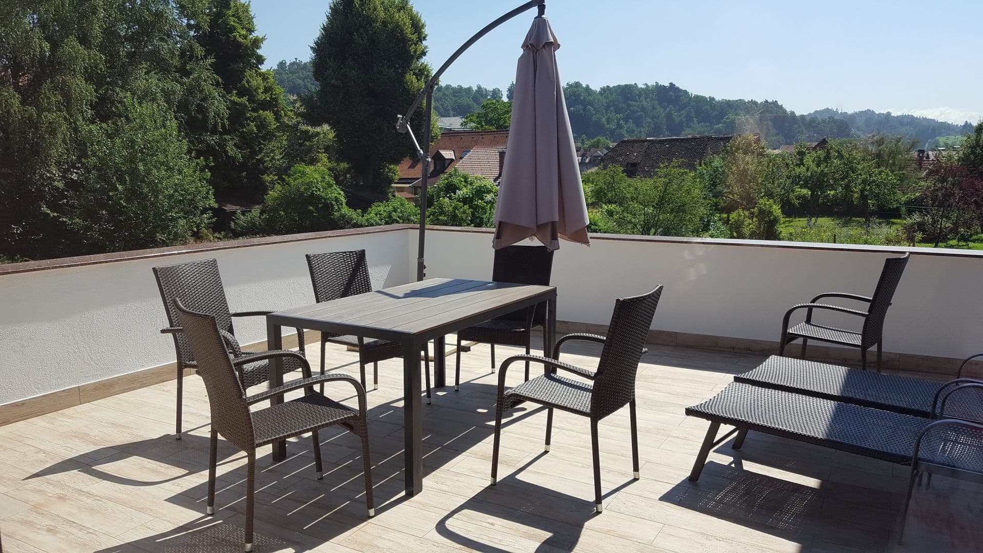 Exterior view of Apartment 3 showing the building and surrounding area